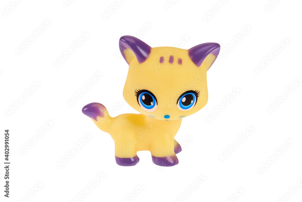 A small toy cat. On a white background, isolated A small toy cat. On a white background, isolated