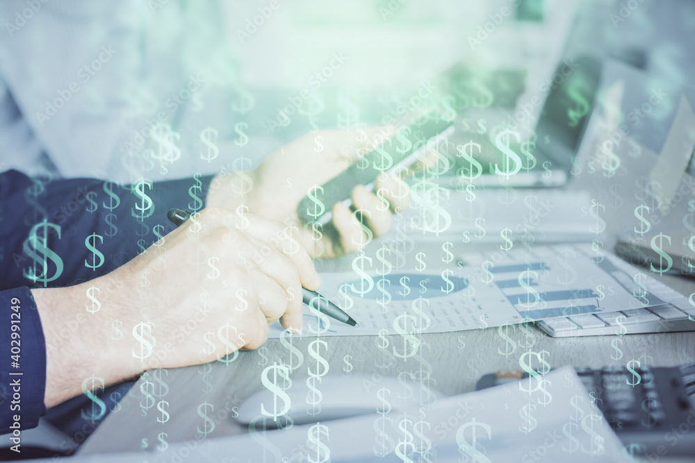 Fototapeta premium Double exposure of man's hands holding and using a digital device and forex graph drawing. Financial market concept.