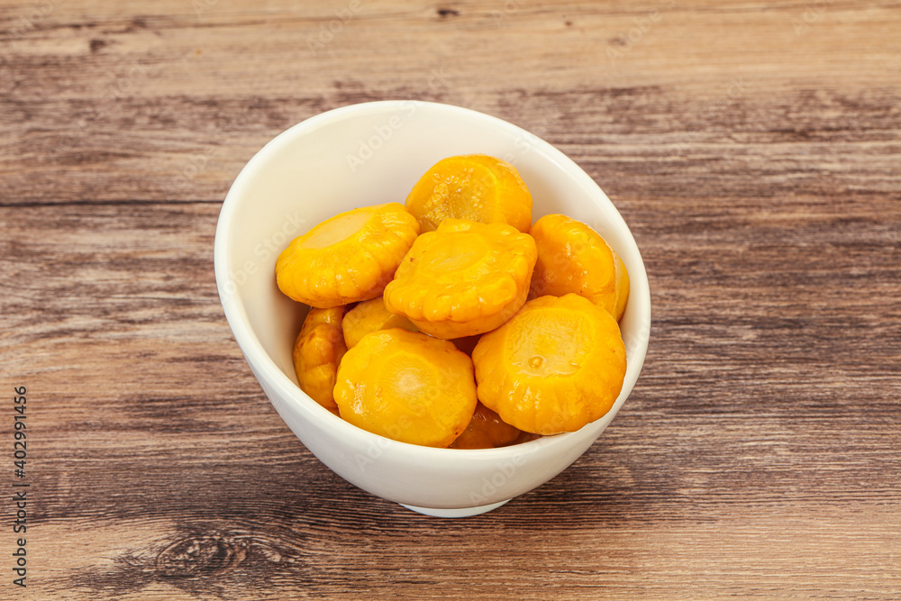 Marinated yellow patisson in the bowl Marinated yellow patisson in the bowl