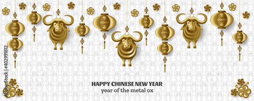 Happy Chinese New Year background with creative golden metal ox, sakura branches, hanging lanterns