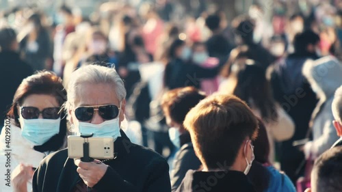 Wallpaper Mural Slow motion of unrecognized people wearing medical face mask in Hong Kong. Coronavirus concept Torontodigital.ca