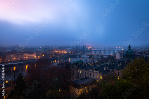 Prague with the bridges over the Vltava river during the moody morning. Czech Republic capital waking up.
