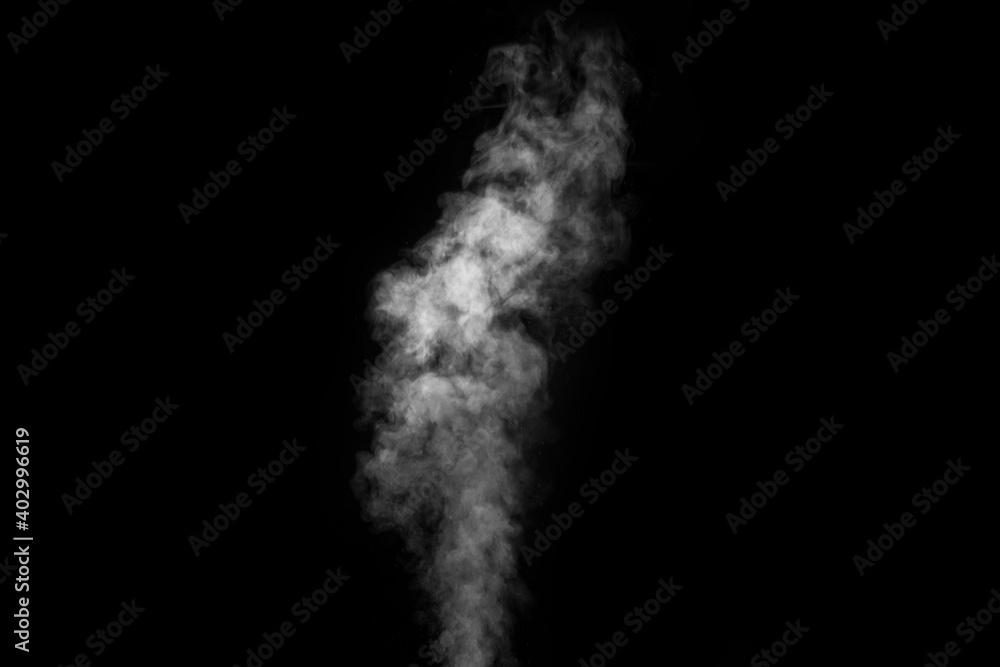 White smoke on black background. Figured smoke on a dark background. Abstract background, design element, for overlay on pictures White smoke on black background. Figured smoke on a dark background. Abstract background, design element, for overlay on pictures