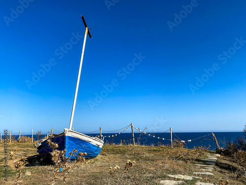 blue white Boat, sky and sea