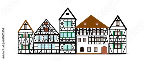 Set of Old german houses with black wooden beams ang green elements. colored half timbered building. Flat facades of european framing houses, cottages