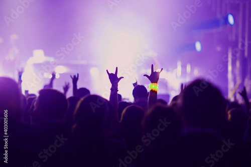 People with hands up at scene on event party entertainment concert.
