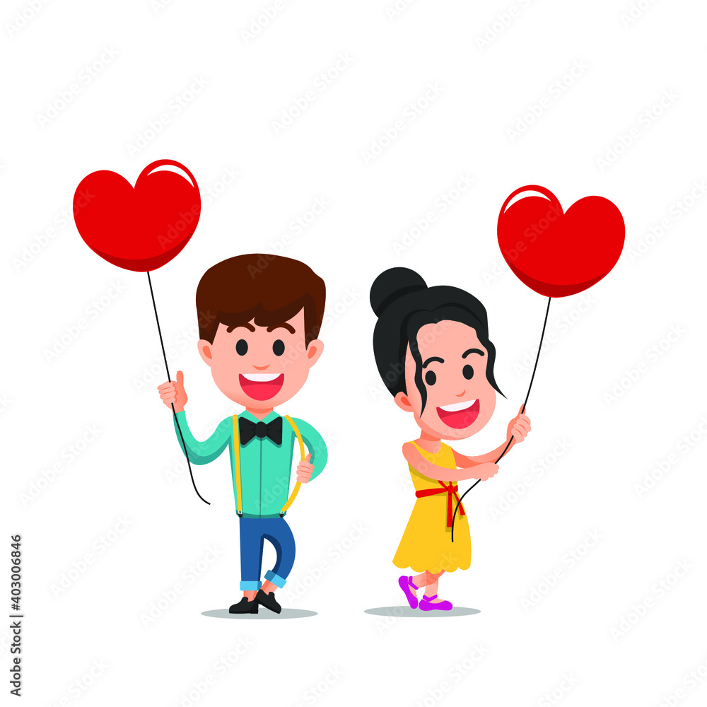 two children holding red heart balloons two children holding red heart balloons
