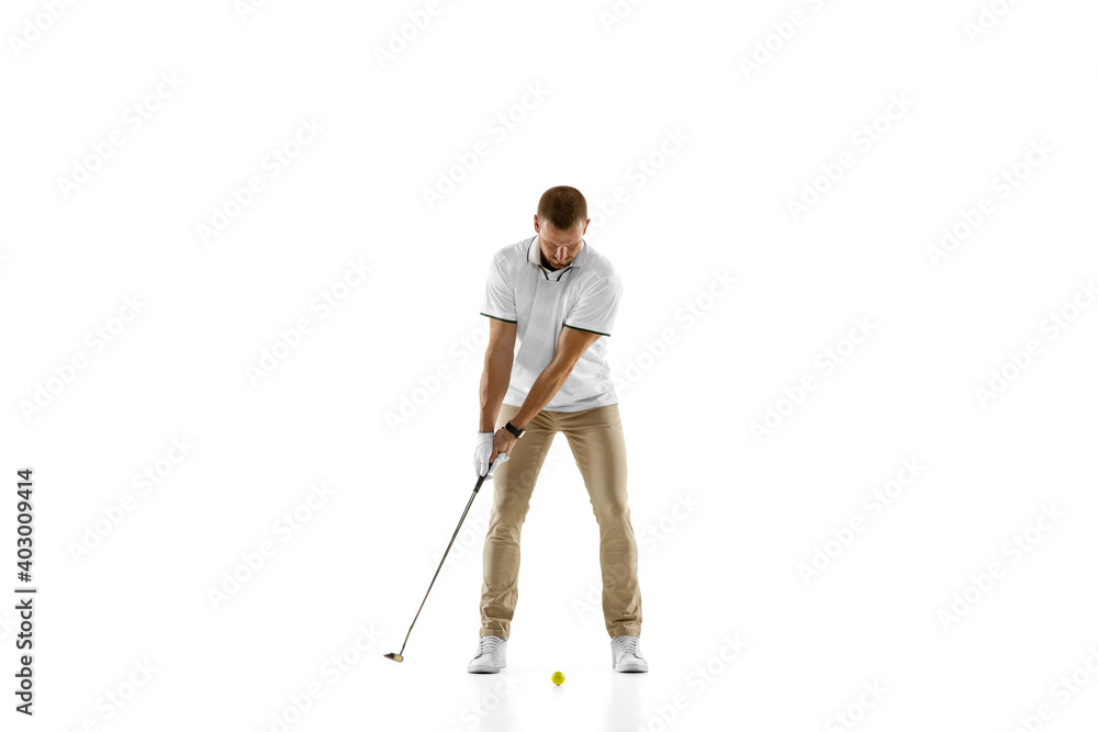 Balance. Golf player in a white shirt practicing, playing isolated on white studio background with copyspace. Professional player practicing with bright emotions and facial expression. Sport concept. Balance. Golf player in a white shirt practicing, playing isolated on white studio background with copyspace. Professional player practicing with bright emotions and facial expression. Sport concept.
