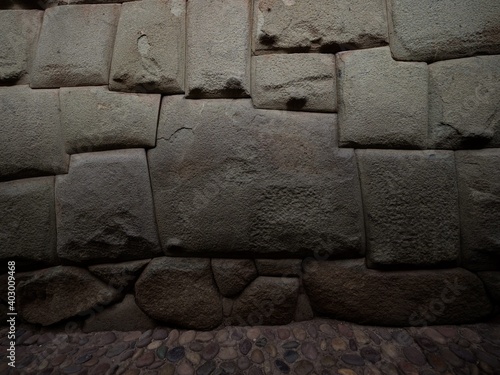 Twelve angled stone archeology heritage part of Archbishops palace wall Cusco Peru South America photo
