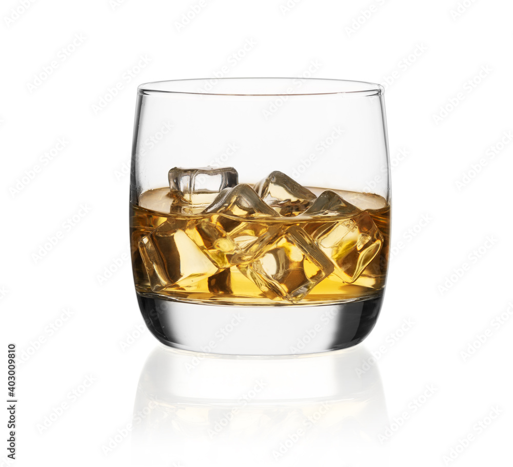 single malt whiskey with ice in a glass isolated on white background with clipping path single malt whiskey with ice in a glass isolated on white background with clipping path