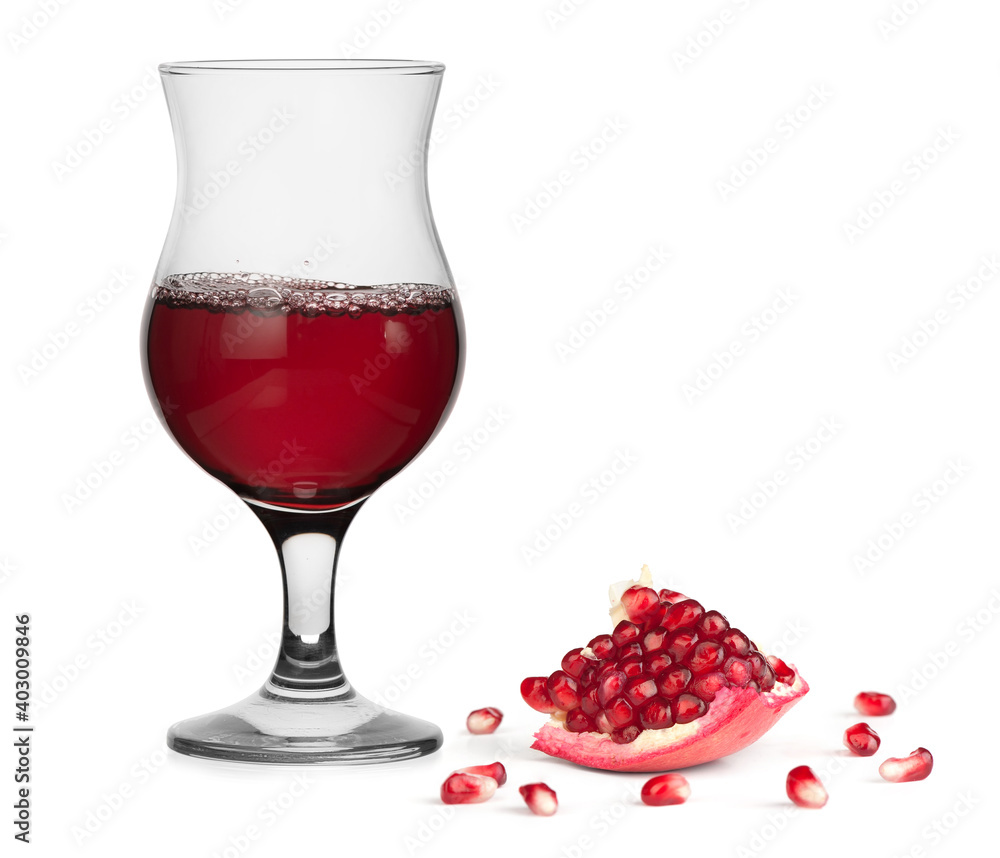 Fresh pomegranate juice in a glass isolated on white Fresh pomegranate juice in a glass isolated on white