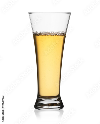 Apple juice in a glass isolated on white background