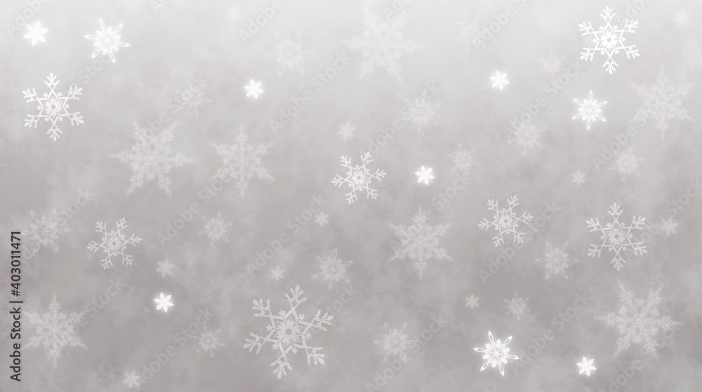 薄いグレーの背景にうすい雪の結晶、寒い冬のイメージ