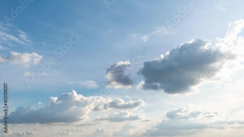 Time lapse of white clouds with blue sky in background,Clouds running across the blue sky,Beautiful nature white clouds.