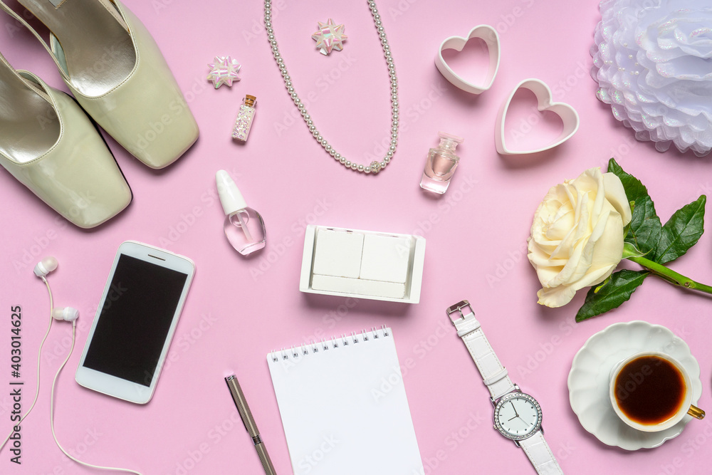 Stylish feminine accessories, bridal decorative items, shoes, jewellery, rose flower, hearts on pink background. Empty calendar date, wedding invitation. Flat lay, top view, copy space, mock up Stylish feminine accessories, bridal decorative items, shoes, jewellery, rose flower, hearts on pink background. Empty calendar date, wedding invitation. Flat lay, top view, copy space, mock up