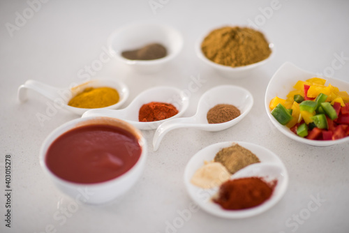 Preparing food in modern white kitchen