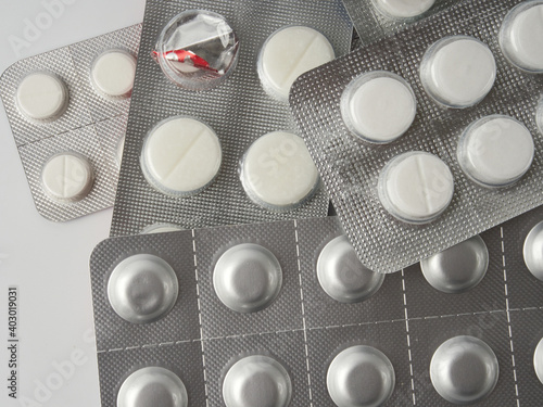 Different medication: tablets, pills in a blister pack, medicine, macro, selective focus, space for copy 