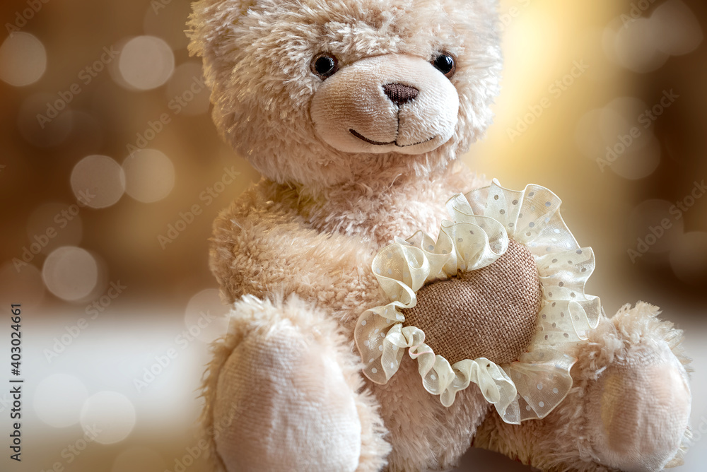 Cute teddy bear with heart in paws. Valentine's day greeting card Cute teddy bear with heart in paws. Valentine's day greeting card