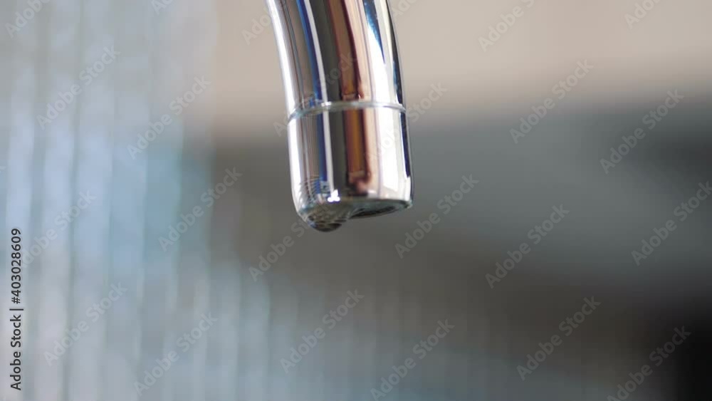 Water dripping from the tap in slow motion 180fps Water dripping from the tap in slow motion 180fps