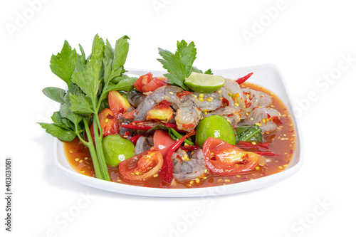 Thai Style spicy seafood salad with shrimps isolated on the white background with clipping path.