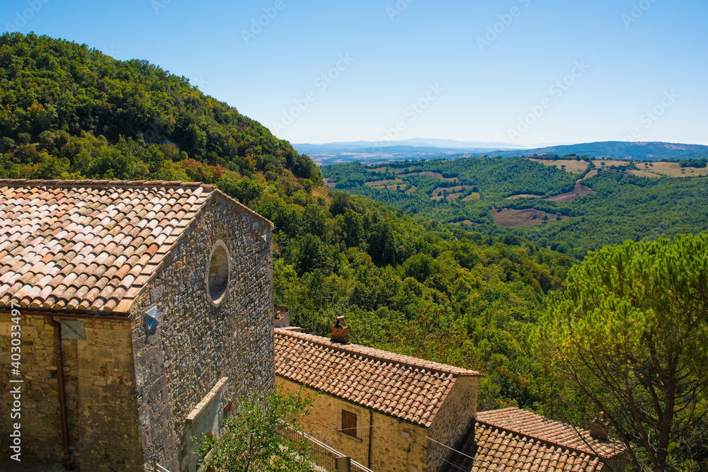 A view of the landscape over rooftops in the historic medieval village of Rocchette di Fazio near Semproniano in Grosseto Province, Tuscany, Italy
A view of the landscape over rooftops in the historic medieval village of Rocchette di Fazio near Semproniano in Grosseto Province, Tuscany, Italy