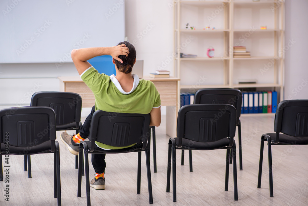 Fototapeta premium Young male student in business presentation concept