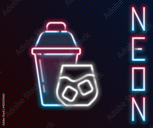 Glowing neon line Cocktail shaker with cocktail glass icon isolated on black background. Colorful outline concept. Vector.