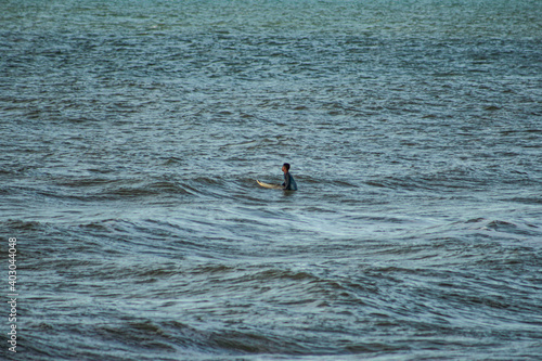 Surfer waiting for waves