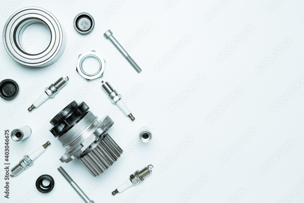 Car service. Auto motor mechanic spare or automotive piece on white background. Set of new metal car part. Repair and vehicle service with space for text. Car service. Auto motor mechanic spare or automotive piece on white background. Set of new metal car part. Repair and vehicle service with space for text.