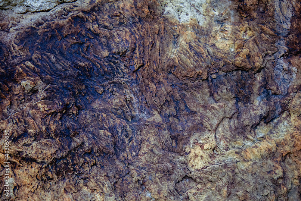 Image of very ancient  prehistoric stone wall texture background.. Free copy space for design.