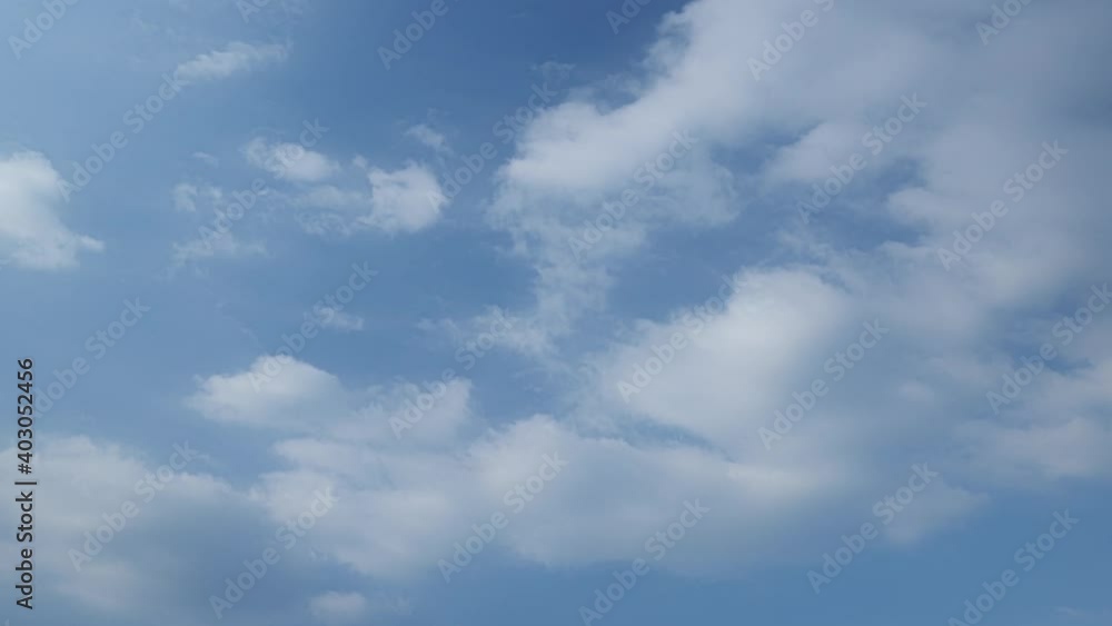 4K Time lapse. beautiful sky with clouds sunset background, Timelapse of skyscrapers, Blue sky with clouds and sun. 4K Time lapse. beautiful sky with clouds sunset background, Timelapse of skyscrapers, Blue sky with clouds and sun.