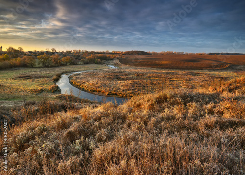 Autumn nature. Landscape of sunrise over river in autumn morning. Nature of Ukraine

