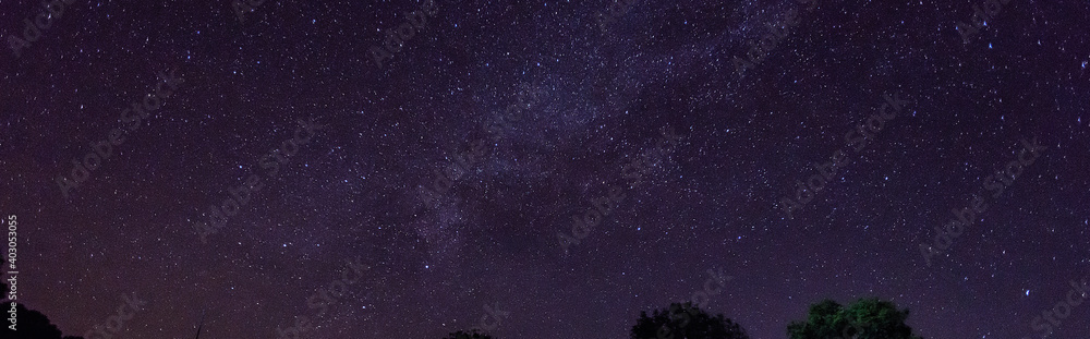 Amazing Panorama blue night sky milky way and star on dark background.