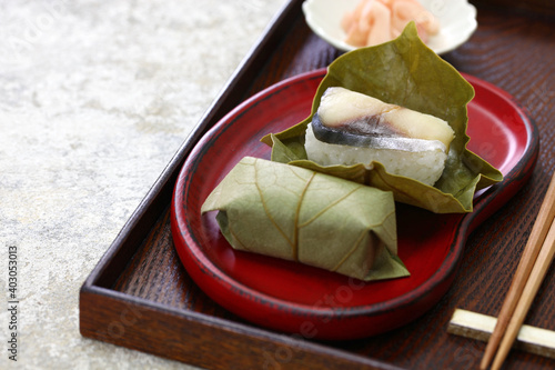 kaki no ha zushi;  mackerel sushi wrapped by persimmon leaf; japanese food photo