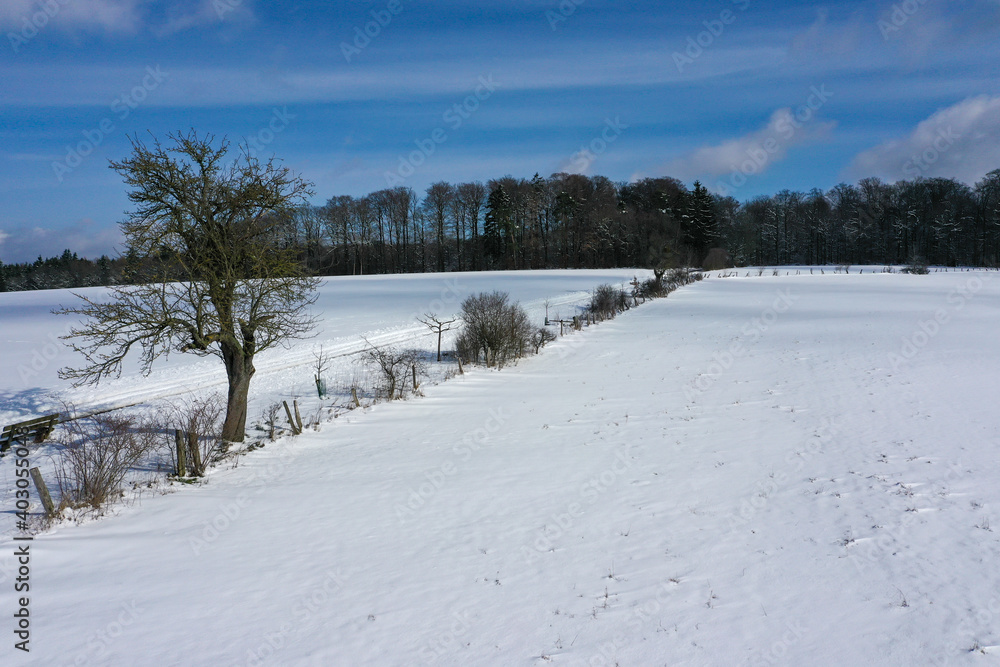 Bird's eye view of a wonderful snow-covered winter landscape in Taunus / Germany Bird's eye view of a wonderful snow-covered winter landscape in Taunus / Germany