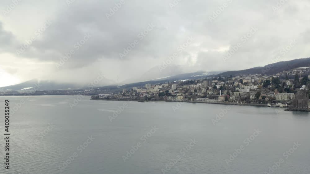 The romantic village Neuchâtel located on the beautiful lake during the winter season in the swiss alpine landscape, Switzerland, Europe. The romantic village Neuchâtel located on the beautiful lake during the winter season in the swiss alpine landscape, Switzerland, Europe.