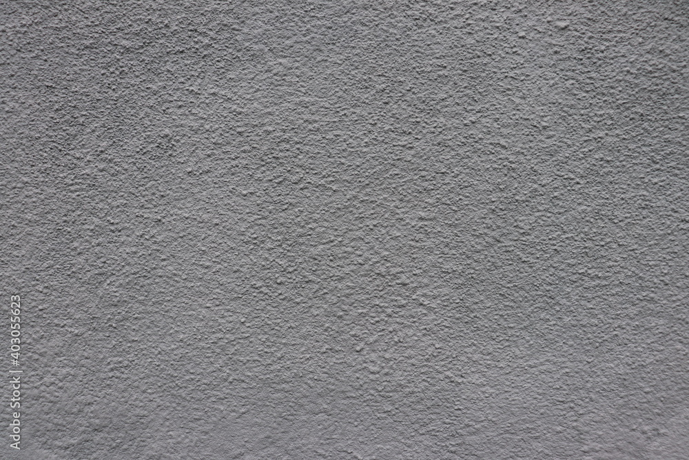Gray plaster on the wall of the building. Gray plaster on the wall of the building.
