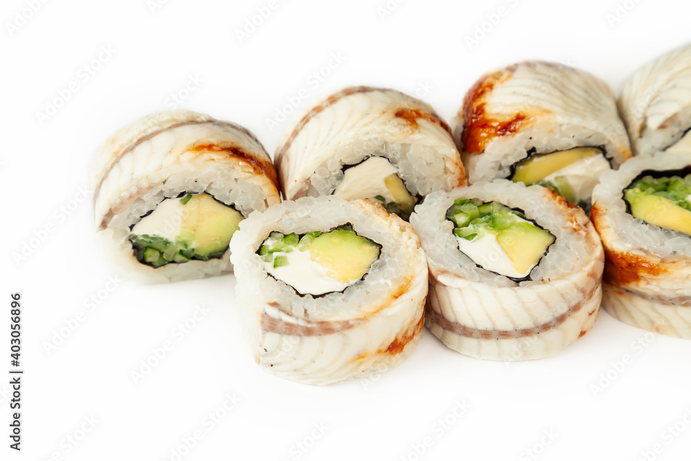 Sushi roll Black dragon on a white background, ingredients Eel, cream cheese, avocado, cucumber, teriyaki sauce, sesame seeds, rice, nori. Traditional Japanese food. For the restaurant menu Sushi roll Black dragon on a white background, ingredients Eel, cream cheese, avocado, cucumber, teriyaki sauce, sesame seeds, rice, nori. Traditional Japanese food. For the restaurant menu