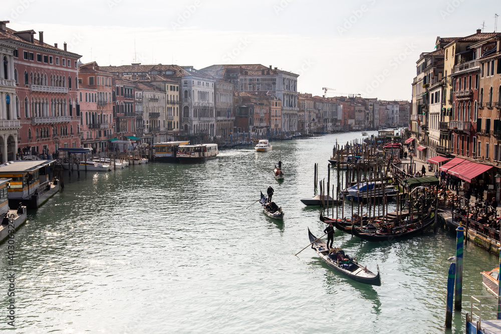 A small harbor for mooring and gondola is popular for sightseeing boat rides in the Venice city.