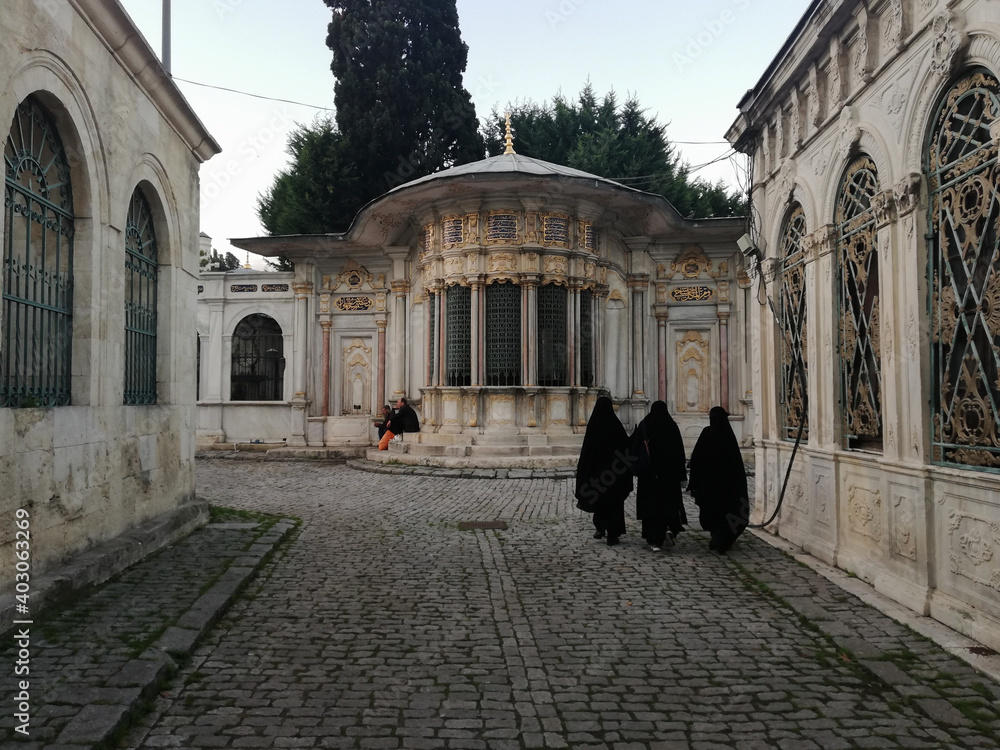 Three muslim women in veils in the street of Istanbul, Turkey