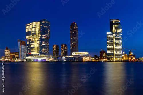 City Landscape - view of the embankment with skyscrapers in Rotterdam at night, The Netherlands, December 28, 2017