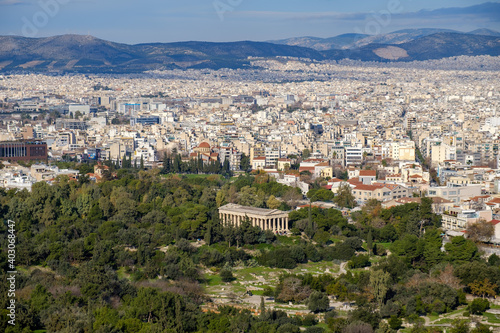 Athens - December 2019: view of the city from the Acropolis with Temple of Hephaestus © Matteo