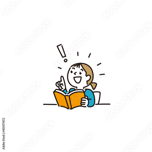 本を読んで何かに気がついた女の子