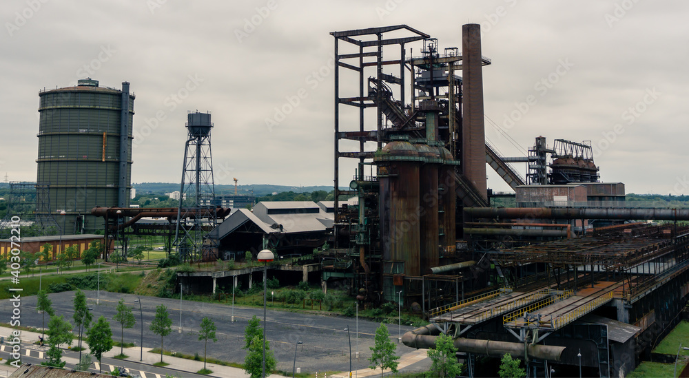 Blast Furnace in Dortmund, Germany. The coal mining and steel in the region collapsed and nowadays this colossal buildings are abandoned and unused. Blast Furnace in Dortmund, Germany. The coal mining and steel in the region collapsed and nowadays this colossal buildings are abandoned and unused.