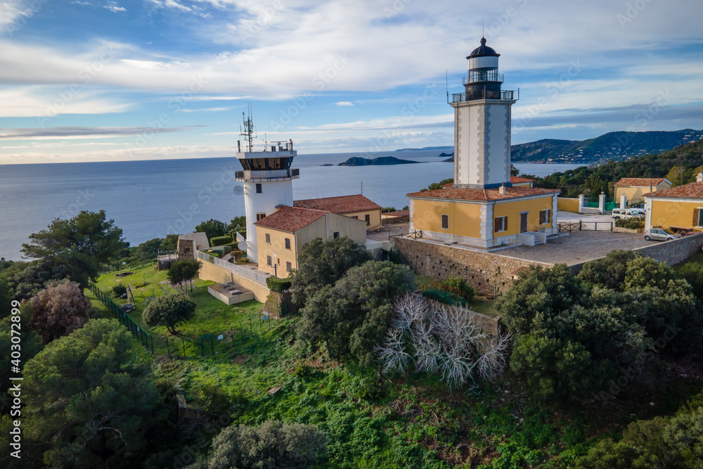 Small island and lighthouse off the coast of Cap Taillat in the mediterranean