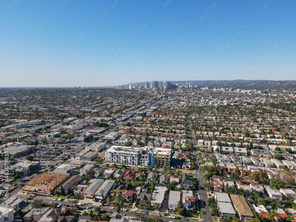 Fototapeta premium Aerial view above Mid-City neighborhood in Central Los Angeles, California. USA