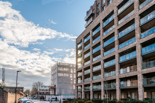 London, United Kingdom, January 04, 2021: New modern apartment block of flats on the Green Street, Upton Gardens, former site of West Ham football ground, Upton Park, Newham