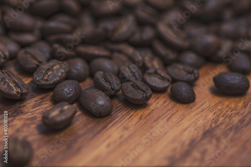 A background of scattered coffee beans.