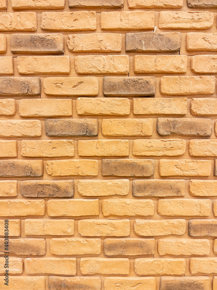 Obraz premium Texture of a wall made of rusty orange colored bricks