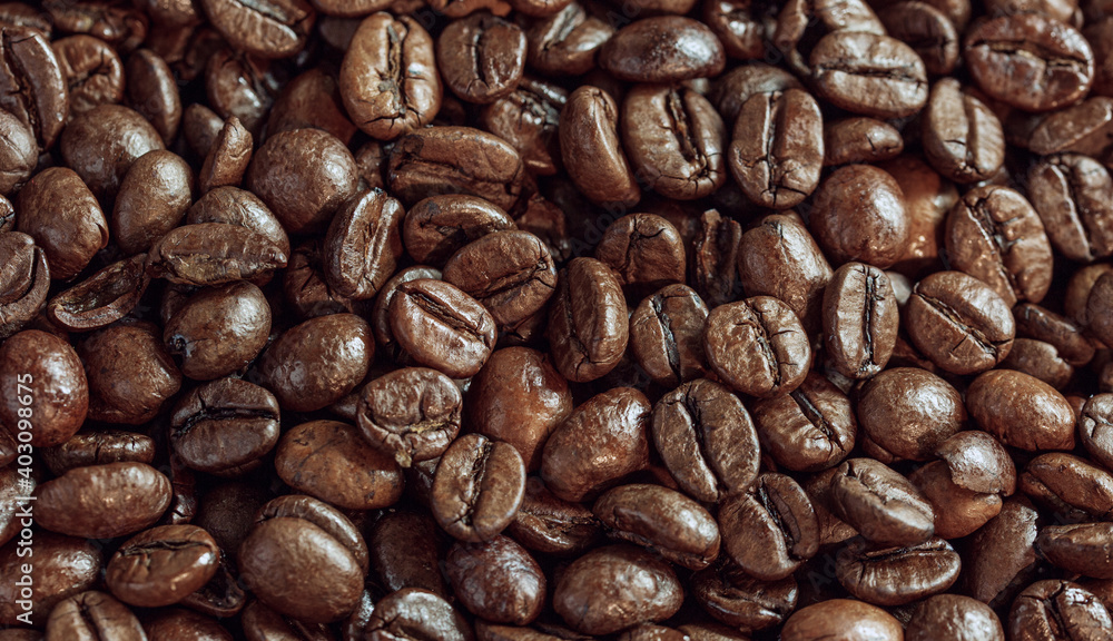 background of brown roasted coffee beans background of brown roasted coffee beans